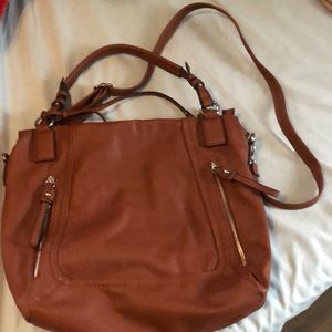 Large brown crossbody bag.